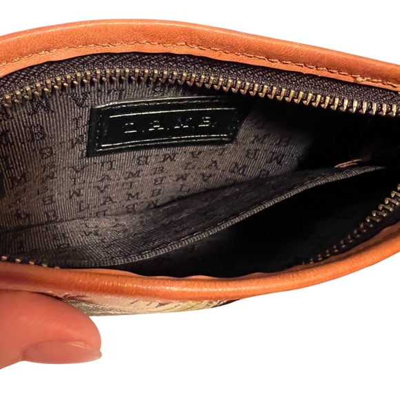 L.A.M.B. Preowned Gwen Stefani Wristlet Wallet
Marigold Floral Graphic  (P069) - Picture 5 of 9